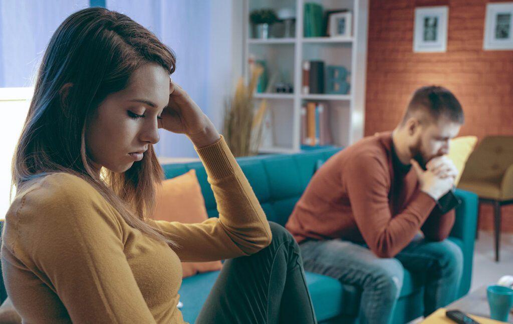 couple-on-couch-distant